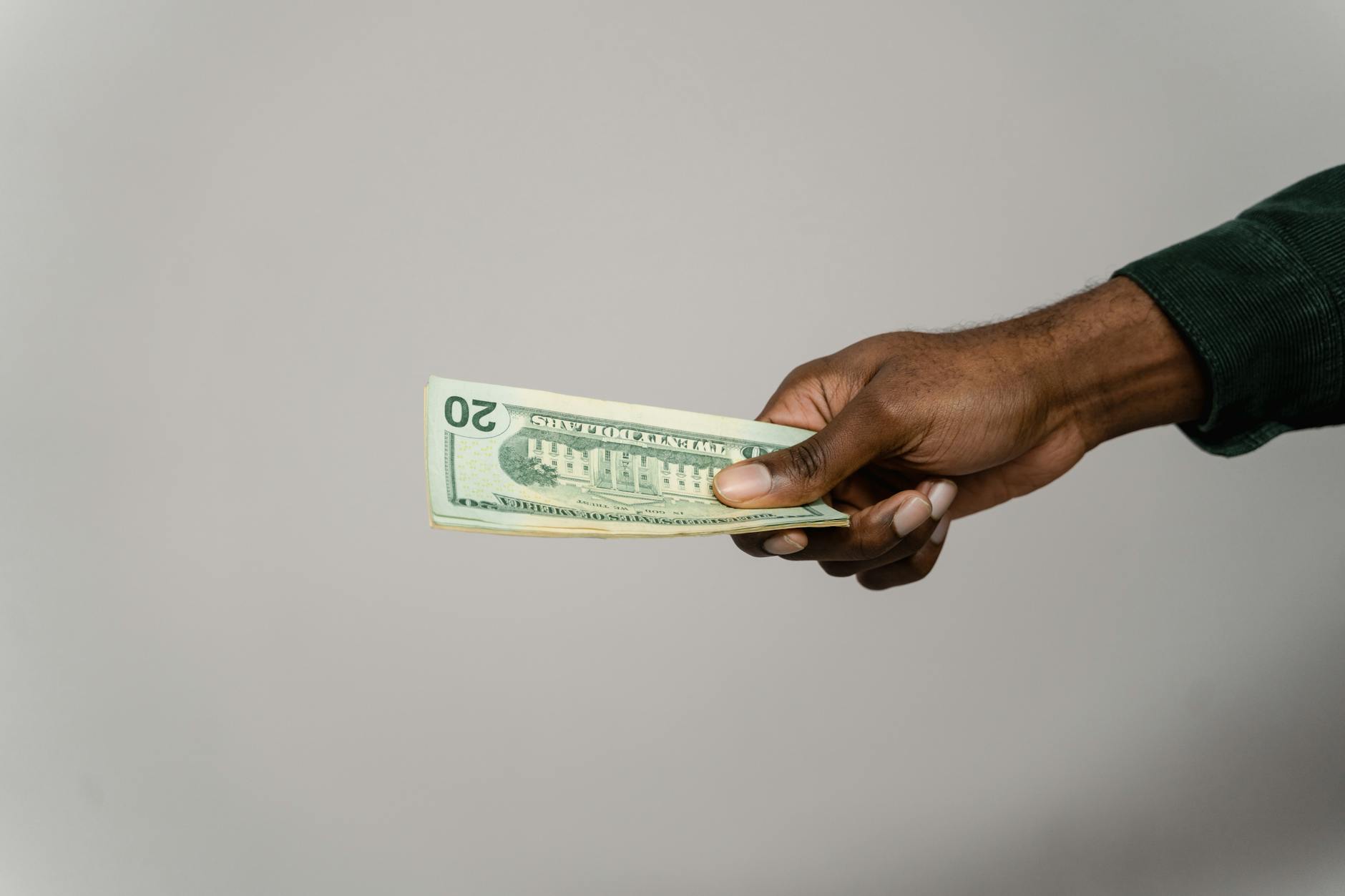 a person holding money